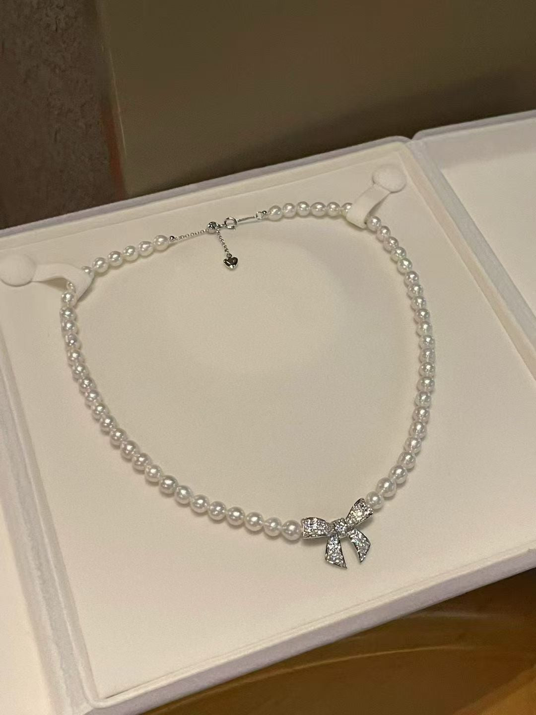 Sparkling Bow & Pearls Necklace & Bracelet Set