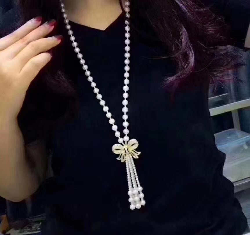 Long Bow Pearl Necklace