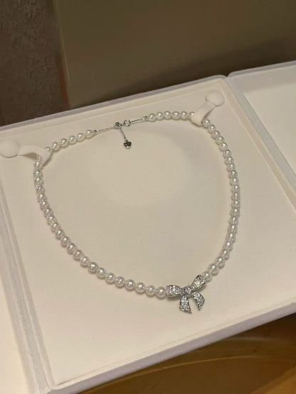 Sparkling Bow & Pearls Necklace & Bracelet Set