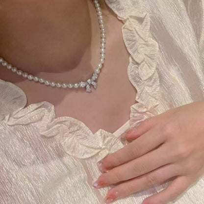 Sparkling Bow & Pearls Necklace & Bracelet Set